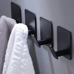 Product image of 26lb Matte Black Stainless Steel Adhesive Towel Hooks, 4-Pack