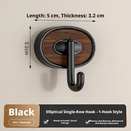 Product image of Medium Oval Single Hook, Black ABS and Wood Composite