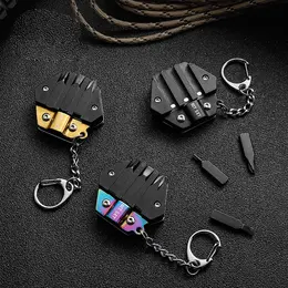 Product image of Mini Folding Coin Knife with Keychain Attachment