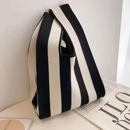 Product image of Hand-held Knitted Vest Bag, Striped Beige Black