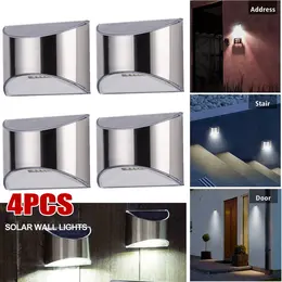 Product image of 4-Pack Solar Powered LED Outdoor Lights for Fences and Walls